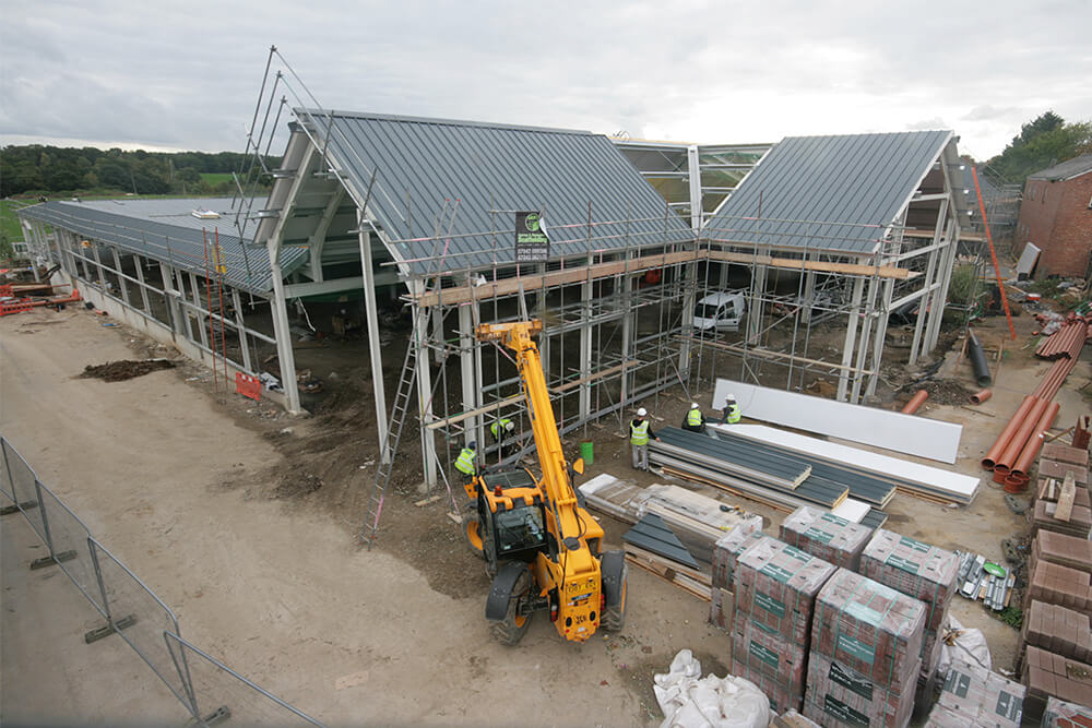 Plant being used to aid in the construction of a new standalone country wares store