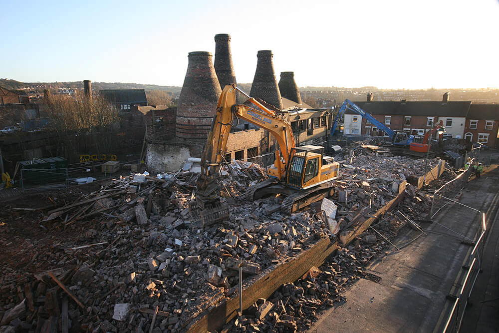 Demolition of buildings adjacent to a heritage site